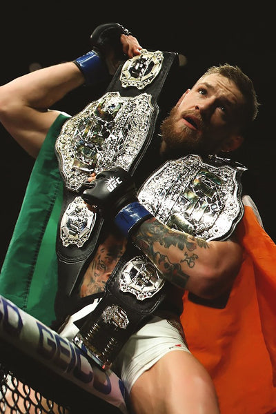 Conor McGregor Sitting on Cage Poster